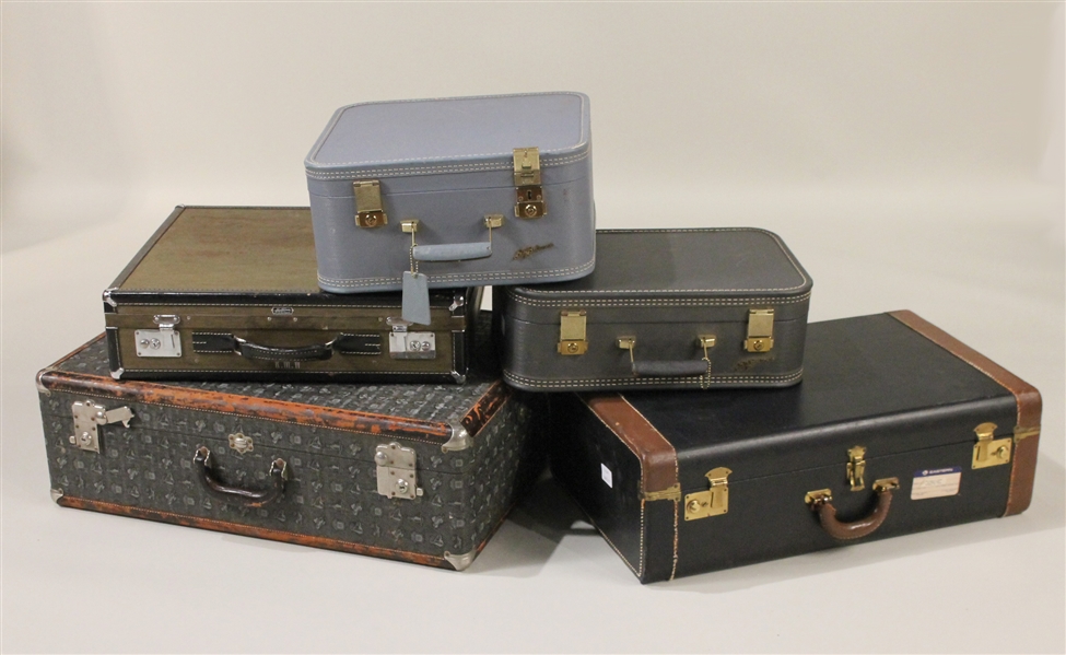 Five Vintage Suitcases