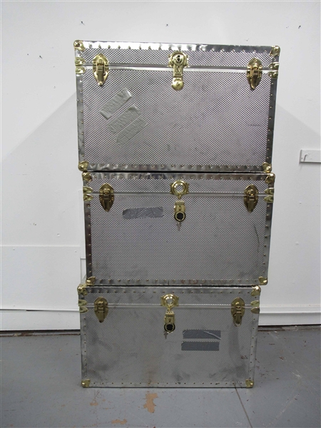 Three Embossed Tin Shipping Trunks