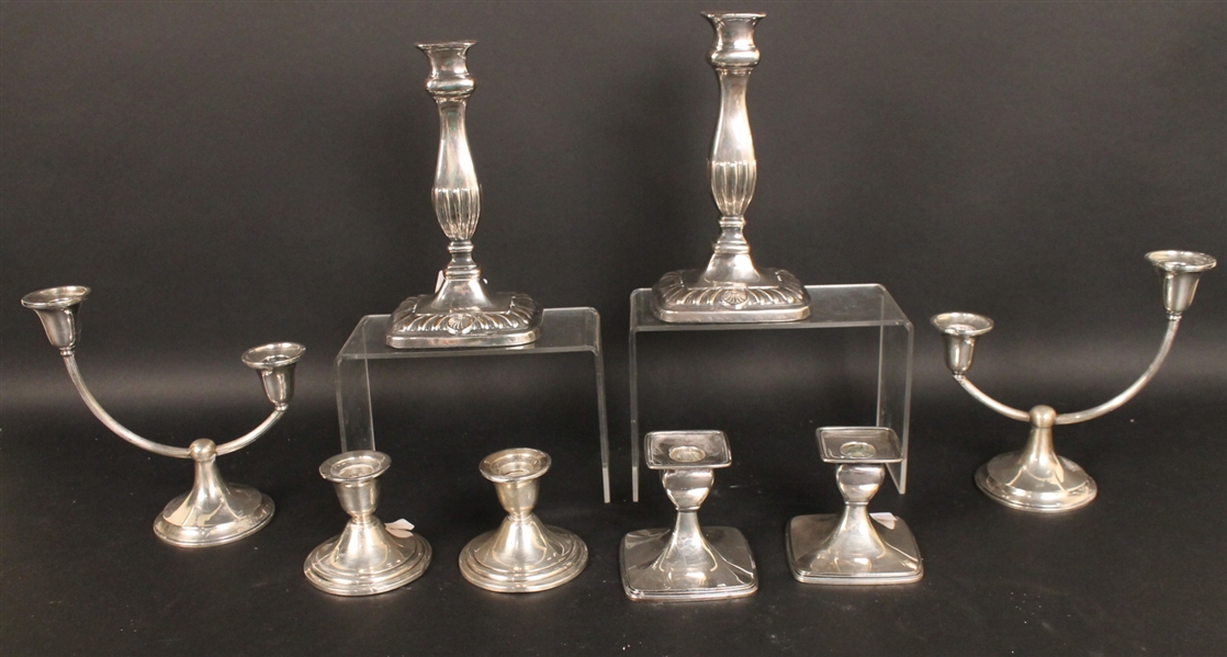 Two Sterling Silver Sets of Candlesticks