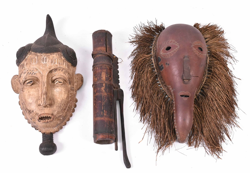Two African Masks and a Set of Arrows