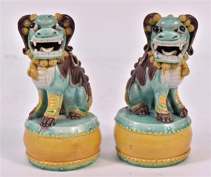 Pair of Chinese Glazed Biscuit Lion Scroll Weight