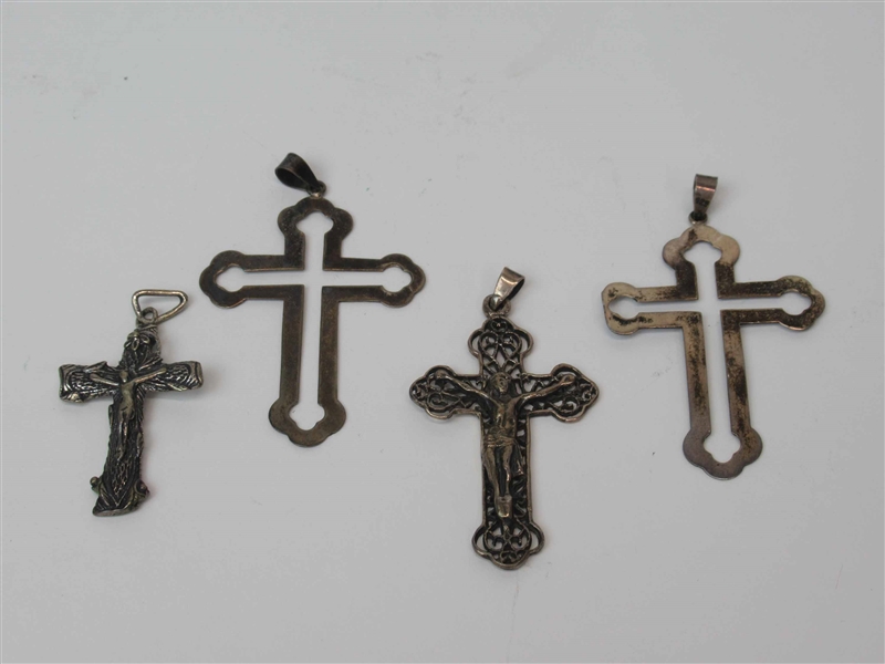 Four Sterling Silver Cross Pendants