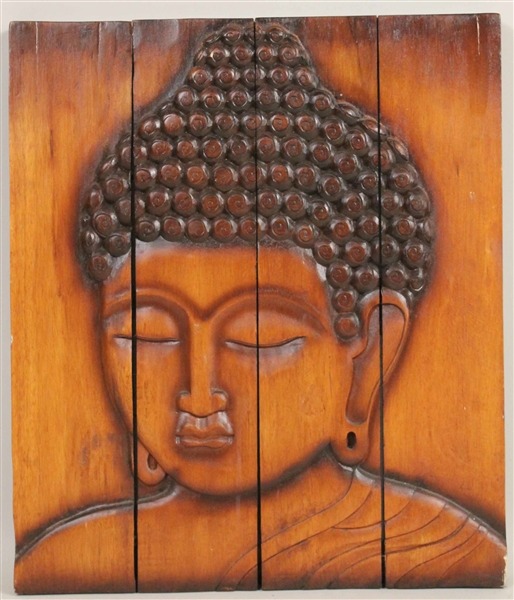 Carved Wood Plaque of a Deity Head
