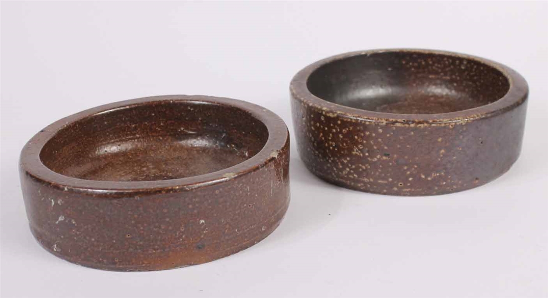 Two Brown Glazed Shallow Bowls