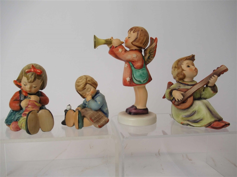 Four M.J. Hummel Goebel Figurines 