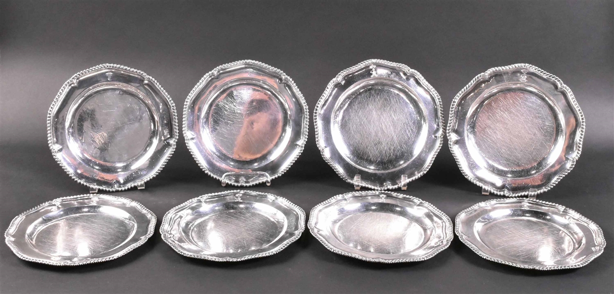 Eight English Georgian Silver Dinner Plates