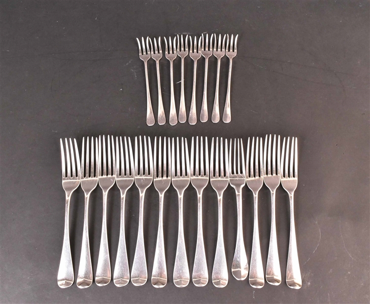Thirteen English Silver Hanoverian Pattern Forks 