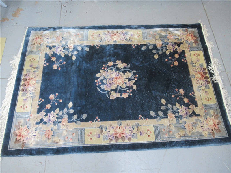 Blue Ground With Central Floral Decoration Rug