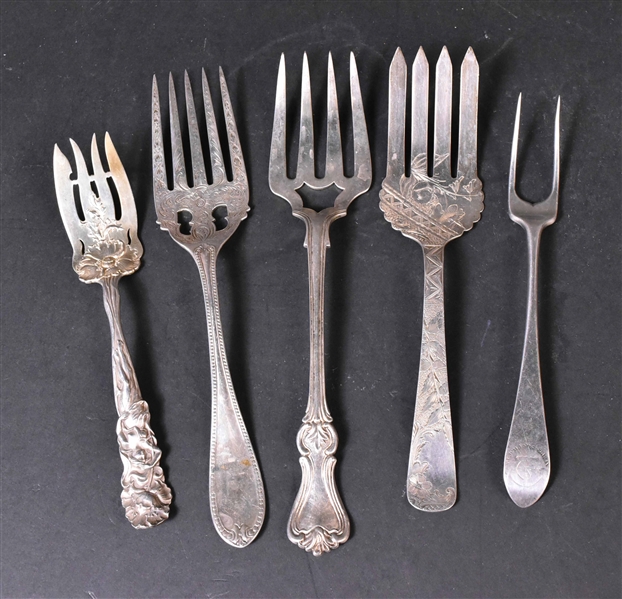 Five Silver Serving Forks
