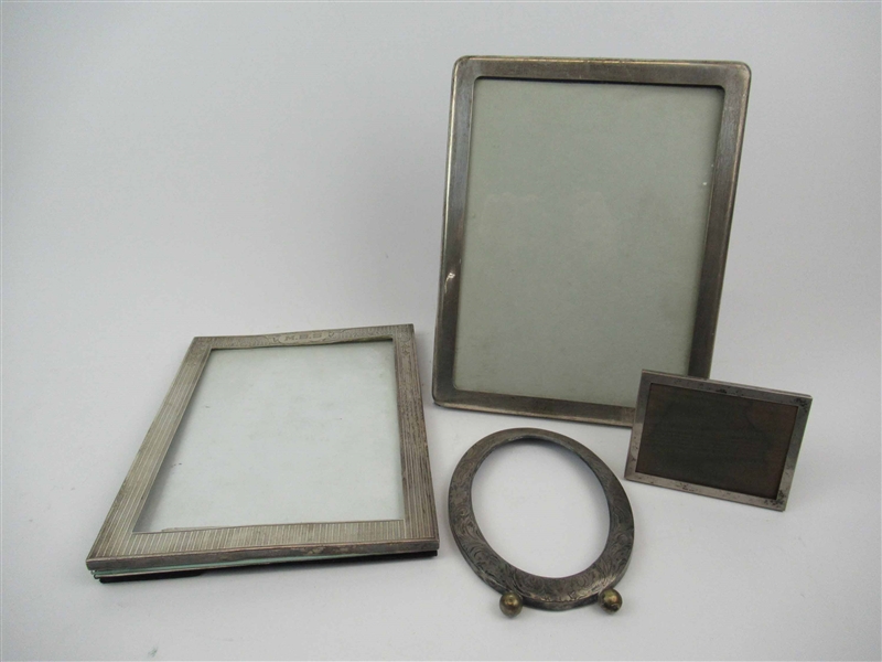 Four Sterling Silver Picture Frames
