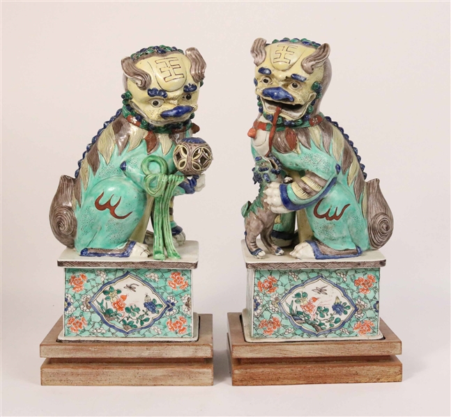 Pair of Porcelain Buddhist Lions