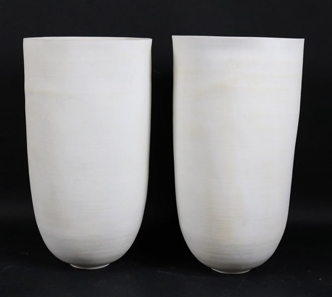 Two White Bisque Vases