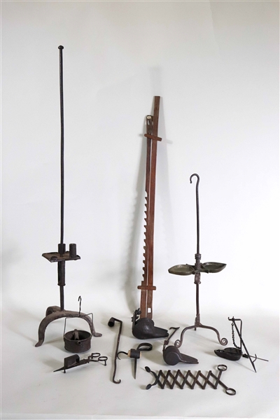 Two Wrought Iron Standing Lighting Devices