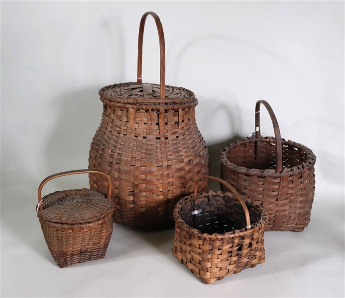 Four Woven Splint-Handled Baskets