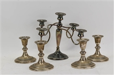 Four Sterling Silver Gadrooned Candlesticks