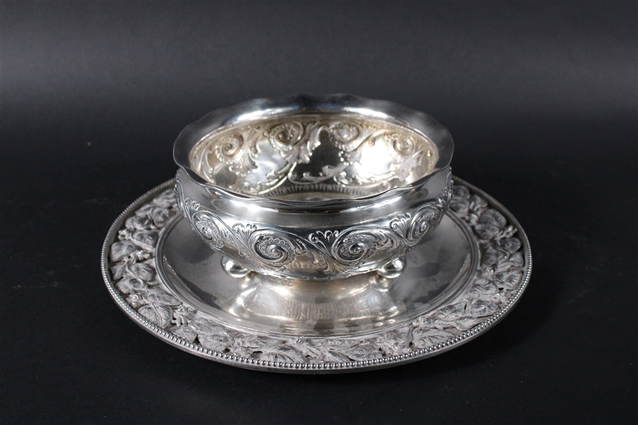 Large Engraved and Repousse Footed Sterling Bowl