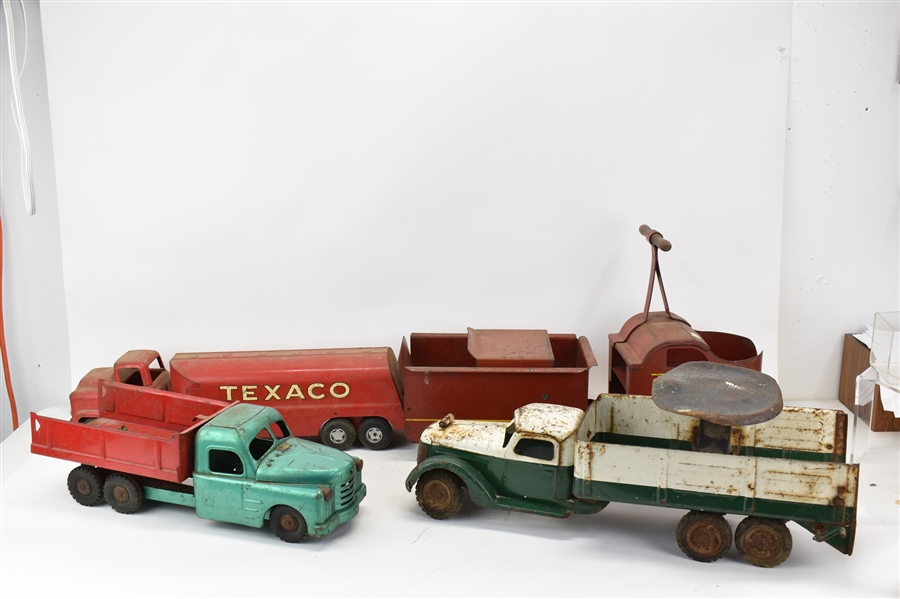 Four Vintage Painted Metal Toy Trucks