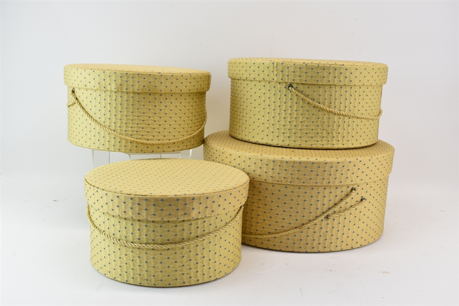 Four Fabric Covered Nesting Hat Boxes