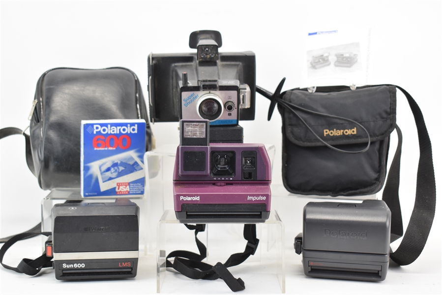 Four Assorted Vintage Polaroid Cameras