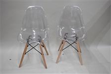 Pair of Modern Clear Side Chairs On Wooden Base