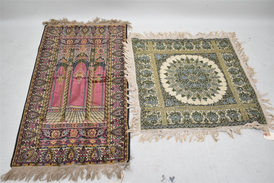 A Group of Silk Rugs and Textiles