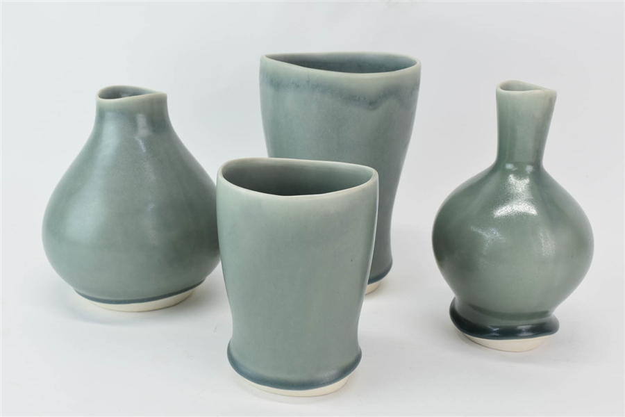 Four Klein Reid Hand Crafted Porcelain Vases