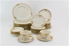 Partial China Dinner Service with Gilt and Birds
