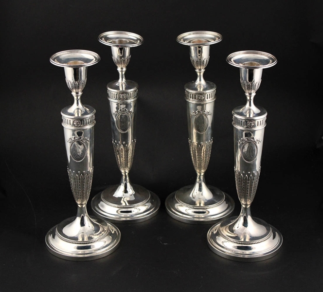 Four Theodore Starr Sterling Silver Candlesticks