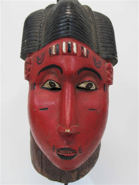 An Oriental Style Carved Wooden Mask