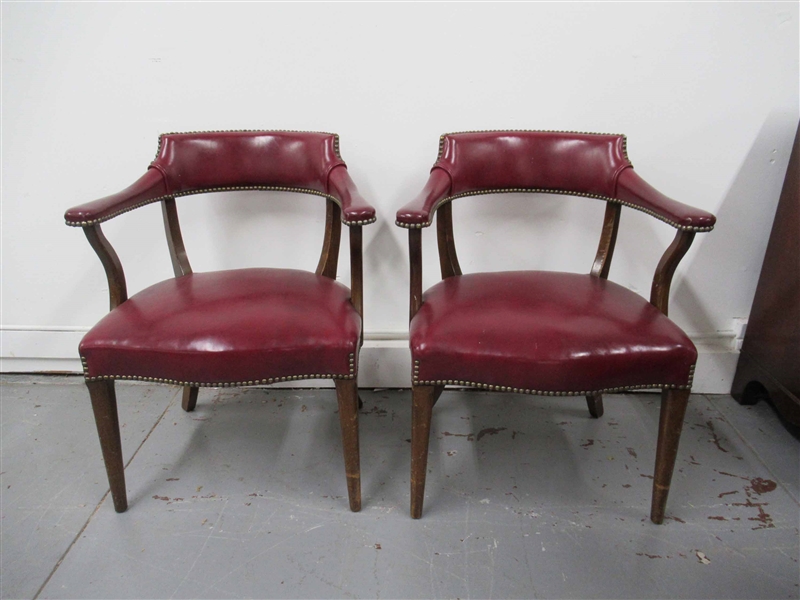 Pair of Oxblood Naugahyde Captains Chairs