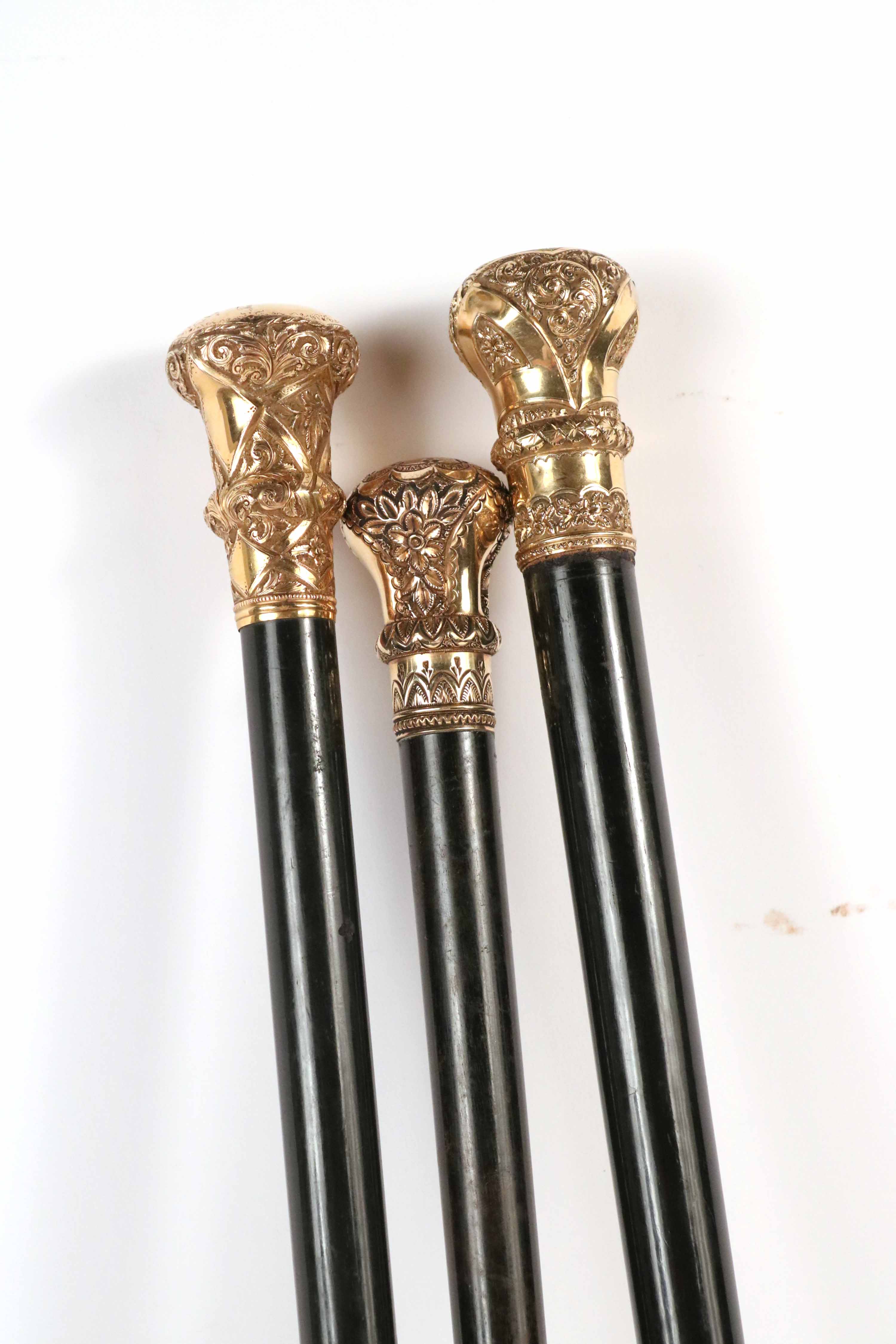 Lot Detail - Three Vintage Rolled Gold Walking Sticks from PA