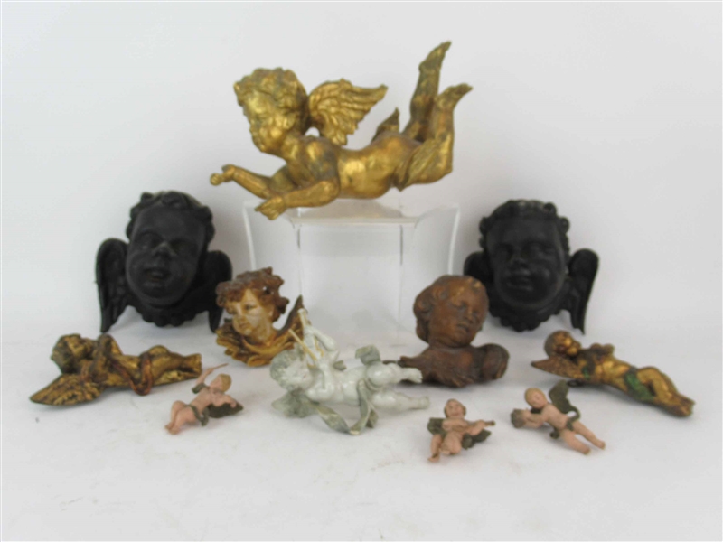 Pair of Continental Carved Cherub Wall Plaques