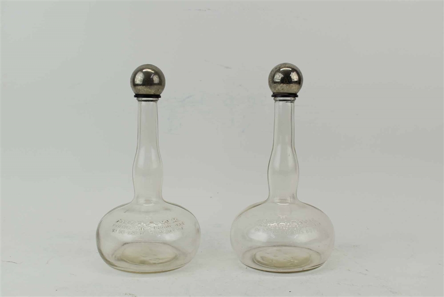 Pair of Mohawk Whiskey Decanter Bottles