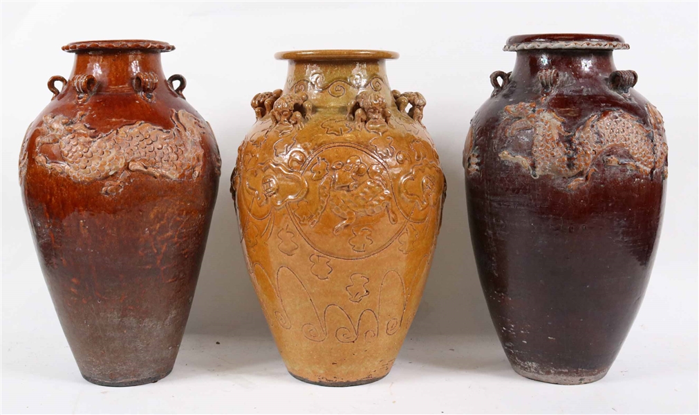 Three Dragon-Decorated Glazed Earthenware Vases
