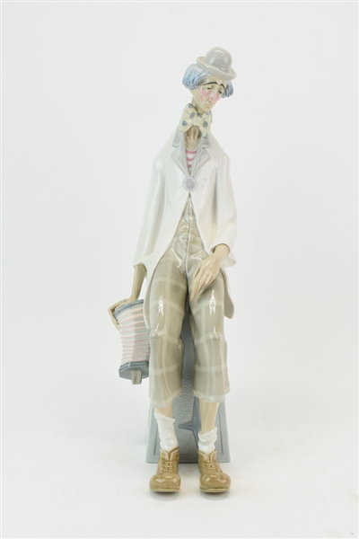 Lladro Sad Clown Seated with Hat and Accordion