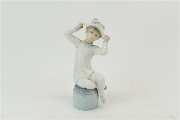 Lladro Seated Girl with Hat Plays Dress Up
