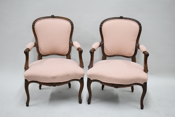Pair of Peach Upholstered Finger Carved Bergeres