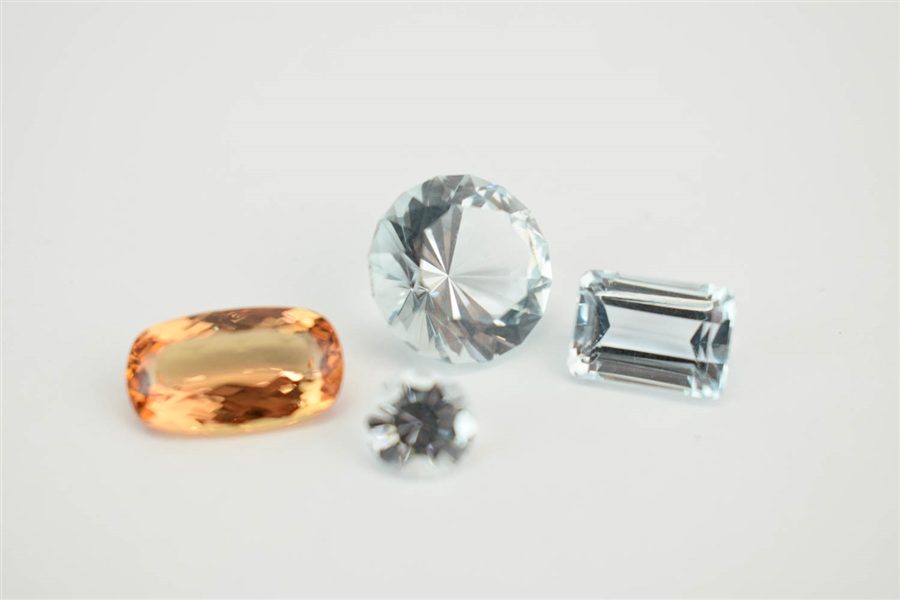 Group of Four Glass Setting Stones