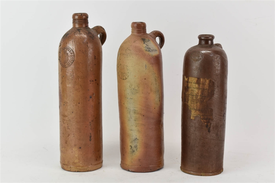 Three Antique Stoneware Bottles