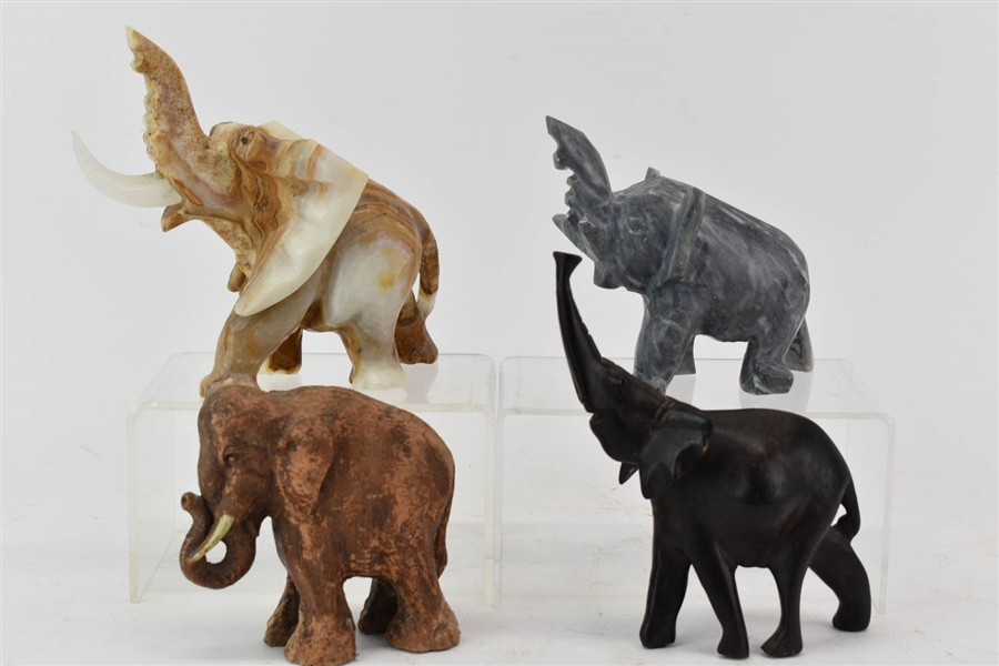 Four Carved Elephant Figurines