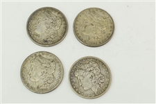 Four 1884 Morgan Silver Dollars