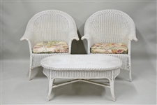 Two White Wicker Patio Chairs