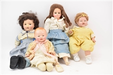 Four Assorted Antique Girl Dolls