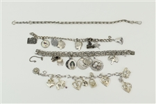 Three Sterling Silver Charm Bracelets with Charms