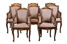 Eight Louis XV Style Parcel-Gilt and Oak Chairs