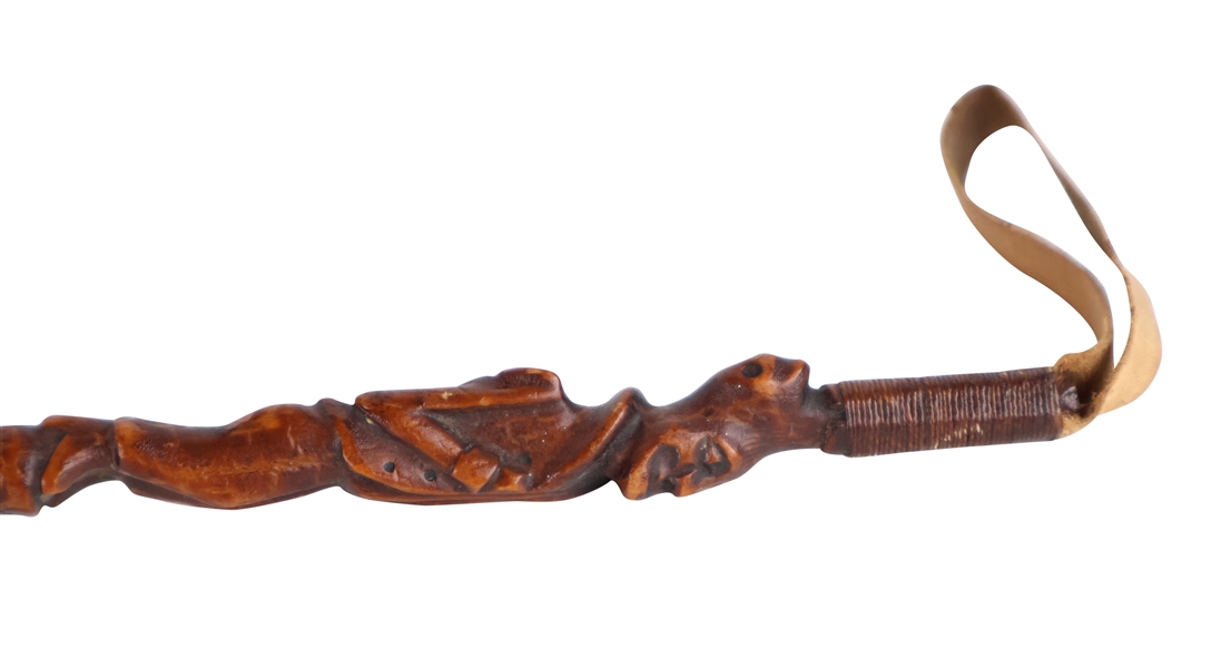 Folk art carved Bugg Whip